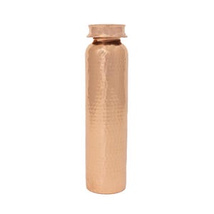 May include: A hammered copper water bottle with a wide mouth and a lid. The bottle is a light copper colour and has a textured surface.