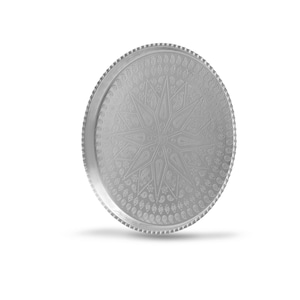 May include: A silver round serving tray with an intricate embossed design of paisley patterns and a starburst in the centre.