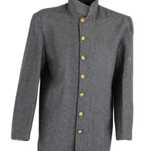 May include: A gray wool jacket with a mandarin collar and six gold-colored buttons down the front. The long-sleeved jacket has a tailored fit and a simple, classic design, suitable for various occasions.