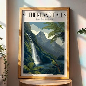 May include: A framed art print depicting Sutherland Falls, a waterfall flowing down a mountain. The artwork includes a parrot, green foliage, and the text "SUTHERLAND FALLS". The print is displayed on a wooden stool near a window with plants.