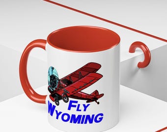Fly Wyoming Accent Coffee 11oz Mug - Perfect Gift for Aviation Lovers, Alaska Enthusiasts, Pilot Gift, Red Biplane Fun Mug, Flying Mug
