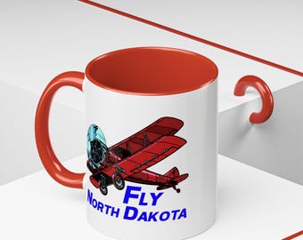 Fly North Dakota Accent Coffee 11oz Mug - Perfect Gift for Aviation Lovers, Alaska Enthusiasts, Pilot Gift, Red Biplane Fun Mug, Flying Mug