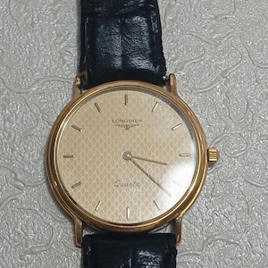 Rare Vintage Longines Men&#39;s Quartz Watch – Original Black Leather Strap, Gold Dial, Swiss Made, 33mm