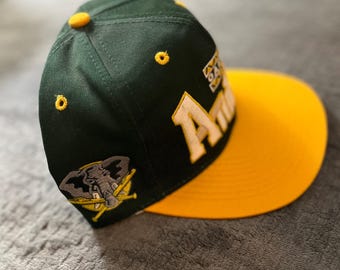 ウェア VINTAGE Oakland Athletics dead stock CAP Vtg 90s Oakland Athletics Catch The Fever 1992 Champs Snapback Hat