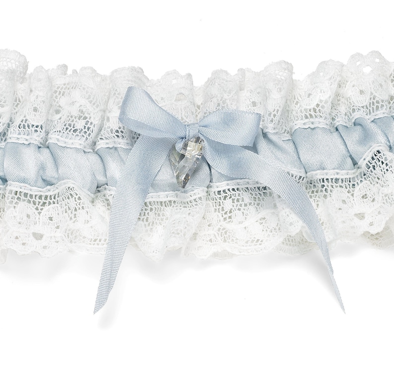 Something blue, silk and lace wedding garter. Swarovski heart