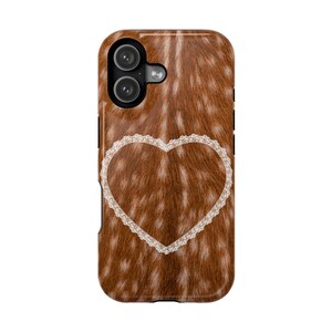 May include: A brown and white patterned phone case with a heart-shaped lace design. The case has a dual-lens camera cutout and black side buttons. The case has a glossy finish.
