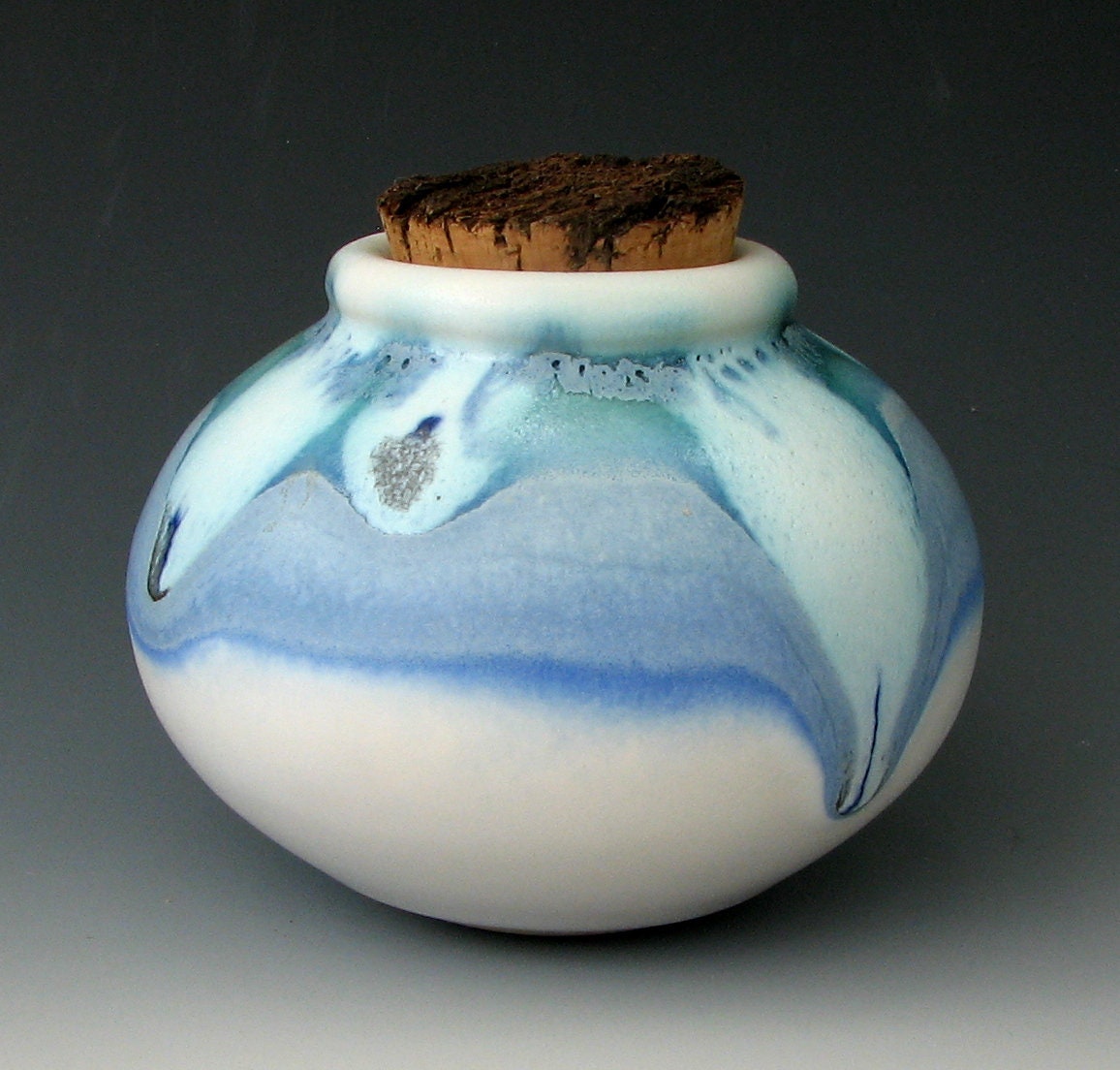 CORKED STONEWARE JAR