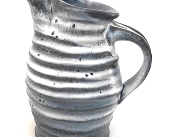 SMALL CERAMIC PITCHER #17 A stoneware pitcher that also make a nice vase.