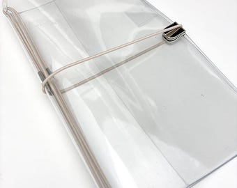 Funda de vinilo transparente para cuaderno de viaje