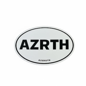 May include: White oval sticker with a black border. The word "AZRTH" is printed in bold, black letters in the center, with "AZEROTH" printed in smaller black letters below.