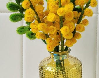 Handmade flowers in a bucket or vase