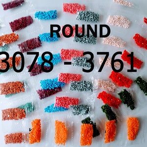 May include: Assortment of small plastic bags filled with colorful round beads. The bags are labeled "ROUND 3078 - 3761".