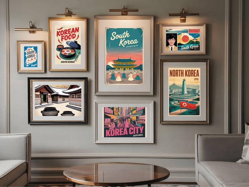 May include: A collection of framed travel posters featuring Korean themes. The posters showcase Korean food, cityscapes, and landmarks, with text such as "South Korea," "North Korea," and "Korea City." The color palette includes blues, reds, and yellows.