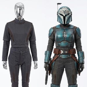 May include: Two full-body mannequins display costumes. One is a dark gray jumpsuit with brown accents. The other is a teal and gray armored suit with a helmet, brown belt, and a blaster pistol. The costumes are from a science fiction theme.
