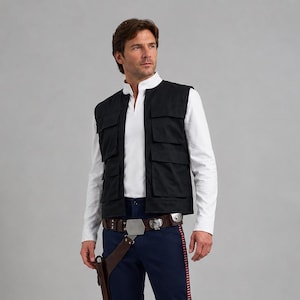 May include: A white long-sleeved shirt with a mandarin collar, a black utility vest with four front pockets, dark blue trousers featuring a thin red side stripe, a brown leather belt with a metal buckle, a holster, and white leather boots.