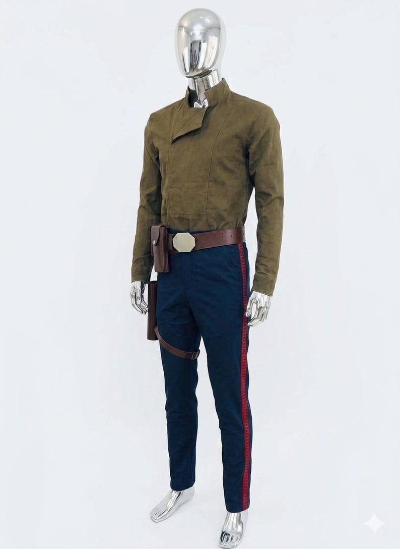 May include: A long-sleeved olive green shirt with a high collar and an asymmetrical front closure. The outfit includes dark blue trousers featuring a vertical red stripe down each leg, paired with a brown leather belt and an attached holster pouch.