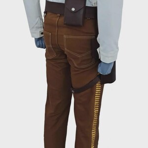 May include: Brown trousers featuring a gold-colored vertical side stripe, paired with a dark brown utility belt. The belt includes a small rectangular pouch with a snap closure and a secondary strap that secures around the upper thigh area.