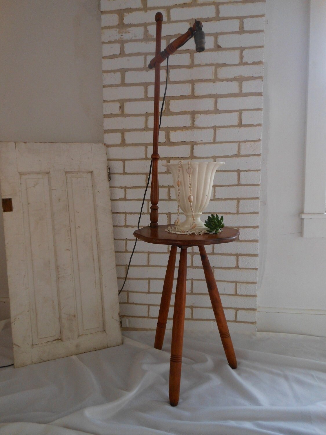 vintage side table with lamp attached