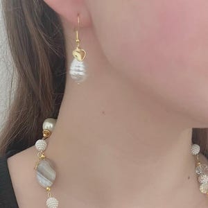 Pearl and gold stainless steel earrings