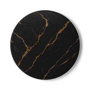 May include: Circular black coaster featuring gold veining, resembling marble. The coaster has a dark base with gold streaks. The design is round and is set against a white backdrop.