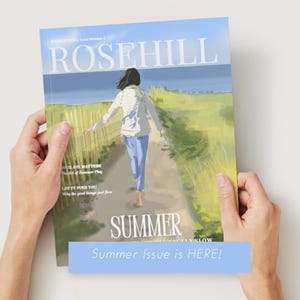May include: A magazine cover with the title "ROSEHILL" and the word "SUMMER" in large letters. The cover art depicts a person walking on a path towards the ocean. The text "Summer Issue is HERE!" is displayed on a blue banner.
