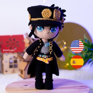 May include: A handmade crochet doll of a character wearing a black hat with gold accents, a black coat, and black pants. The doll has blue eyes and a detailed belt. The doll is standing on a wooden surface. The doll is a character from a Japanese anime.