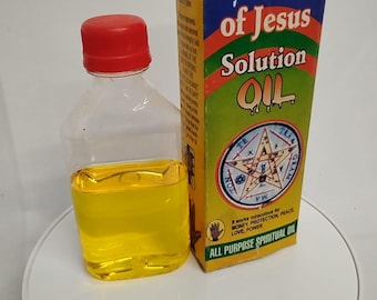 May include: A clear glass bottle with a red cap filled with yellow liquid. The bottle is labeled "Holy Wonderful Blood of Jesus Solution Oil" and states it works for money, protection, peace, love, and power. It is an all-purpose spiritual oil.