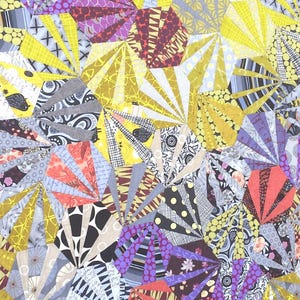 May include: A quilt featuring a dense, repeating pattern of fan-shaped segments arranged in a hexagonal layout. The fabric pieces display a variety of colors including yellow, purple, black, white, and coral, with diverse geometric and floral prints.