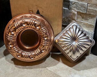 2 vintage copper Jell-O molds or wall hangings
