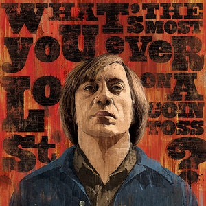 May include: A man with long brown hair wearing a blue denim jacket. The background is a red and orange abstract design with the text "What's the most you ever lost on a coin toss?"