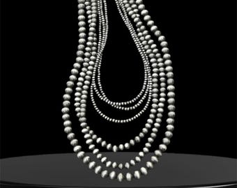 May include: A multi-strand necklace featuring five distinct layers of round, metallic silver-toned beads. The strands vary in length, creating a cascading effect, and are connected at the top by a silver-toned metal clasp and an adjustable chain link.