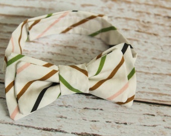 Handmade baby boys cotton candy stripes bow tie with adjustable strap in cream, pink green and blue