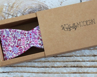 Handmade men's ditsy floral bow tie in berry, purple, pink