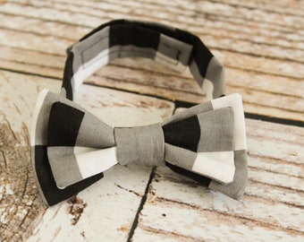 Handmade boys black and white buffalo plaid bow tie with adjustable strap