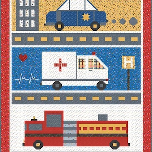 May include: A colorful quilt featuring a police car, ambulance, and fire truck on roads. The police car is blue with a yellow star, the ambulance is white with a red cross, and the fire truck is red. The background has a city theme.
