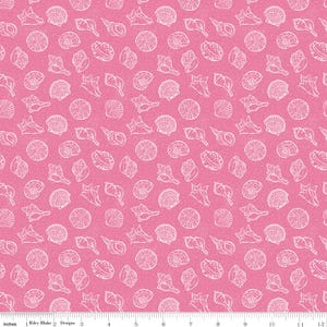 May include: Pink fabric with a repeating pattern of white seashell illustrations. The design includes various types of shells, such as conchs and spiral shells, creating a beach or nautical theme. The fabric has a textured appearance.