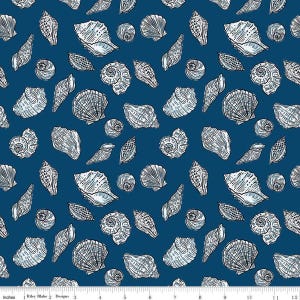 May include: A fabric pattern featuring various white and light blue seashells on a dark blue background. The design includes detailed illustrations of different shell types, creating a nautical or coastal theme. The pattern repeats across the fabric.