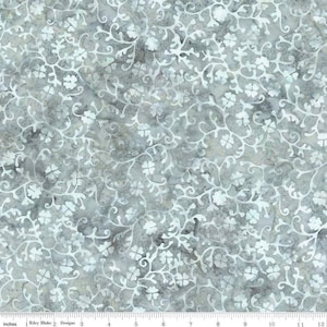 May include: Fabric with a gray and white floral pattern. The design features delicate white vines and flowers against a mottled gray background. The fabric is measured in inches.