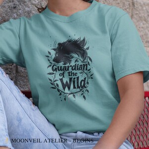 Guardian of the Wild Wolf T-Shirt,Unisex Nature Lover Tee,Eco-Friendly Forest Spirit Apparel,Earth Day Gift,Adventure Inspired Graphic Shirt