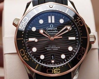 Reloj Omega Seamaster automático vintage para hombre, de acero y oro Sedna de 18 quilates, con esfera negra. Número de artículo: 210.22.42.20.01.002