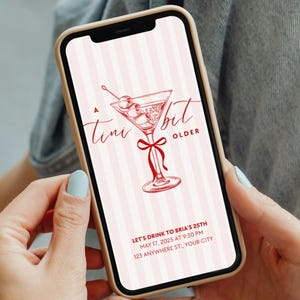 May include: A pink and white striped phone screen with a red martini glass illustration and the text "A tini bit OLDER". The text below the illustration reads "LET'S DRINK TO BRIA'S 25TH MAY 17, 2025 AT 9:30 PM 123 ANYWHERE ST., YOUR CITY".
