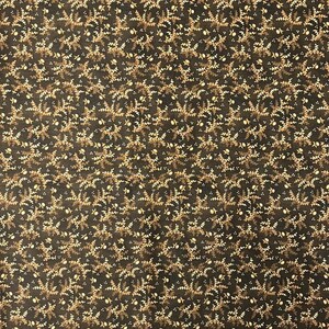 May include: Dark brown fabric with a repeating pattern of small, stylized floral and leaf motifs in shades of tan and off-white. The design creates a dense, all-over texture, suitable for various craft and sewing projects.