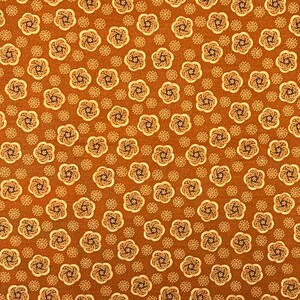 May include: A repeating pattern of stylized floral and dot designs on a brown background. The flowers are cream-colored with dark brown centers, and the dots are a lighter shade of brown. This fabric design is suitable for various craft projects.