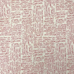 May include: Off-white fabric with a repeating pattern of red cursive text. The text includes holiday greetings such as "Merry Christmas", "Happy Holidays", and "Bonne Noel". The overall theme is festive and seasonal.