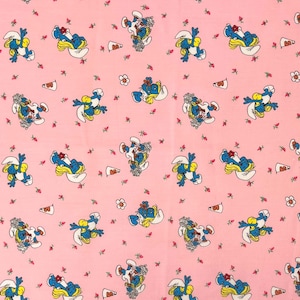 Tela para patchwork "Smurfette" de Peyo, 1982, de Tigress Pride Ltd. Wallace Berrie & Co. - 100% algodón - Se vende por medio metro - 45,7 cm x 109 cm (ancho de la tela)