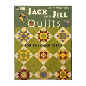 May include: A book titled "Jack and Jill and Quilts" by Retta Warehime. The cover features a green background with a quilt pattern of various colored squares. The text "For Boys and Girls" is also visible.