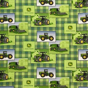 May include: Green and yellow John Deere tractor pattern on a green and blue plaid background. The pattern includes images of tractors, combines, barns, and the John Deere logo. The overall theme is agriculture and farming.