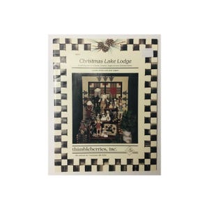 Thimbleberries Christmas Lake Lodge BL010 by Lynette Jensen & Jean Lepper. Quilt/Sewing Pattern. Finished size 46 1/2&quot; x 46 1/2&quot;.