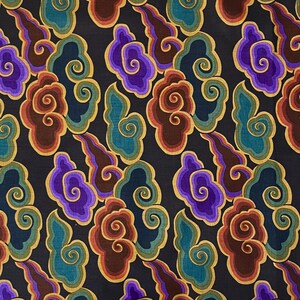 May include: A black fabric featuring a repeating pattern of stylised, swirling clouds in vibrant shades of purple, teal, and deep brown. Each cloud shape is outlined with a thin gold border, creating a distinct contrast against the dark background.