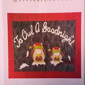 May include: A quilting pattern featuring two owls wearing Santa hats with the text "To Owl A Goodnight" and the pattern number "QC306-13".